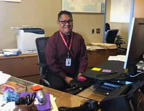 Superintendent at desk